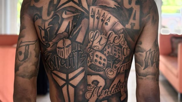 View of Ja Morant's back tattoos.